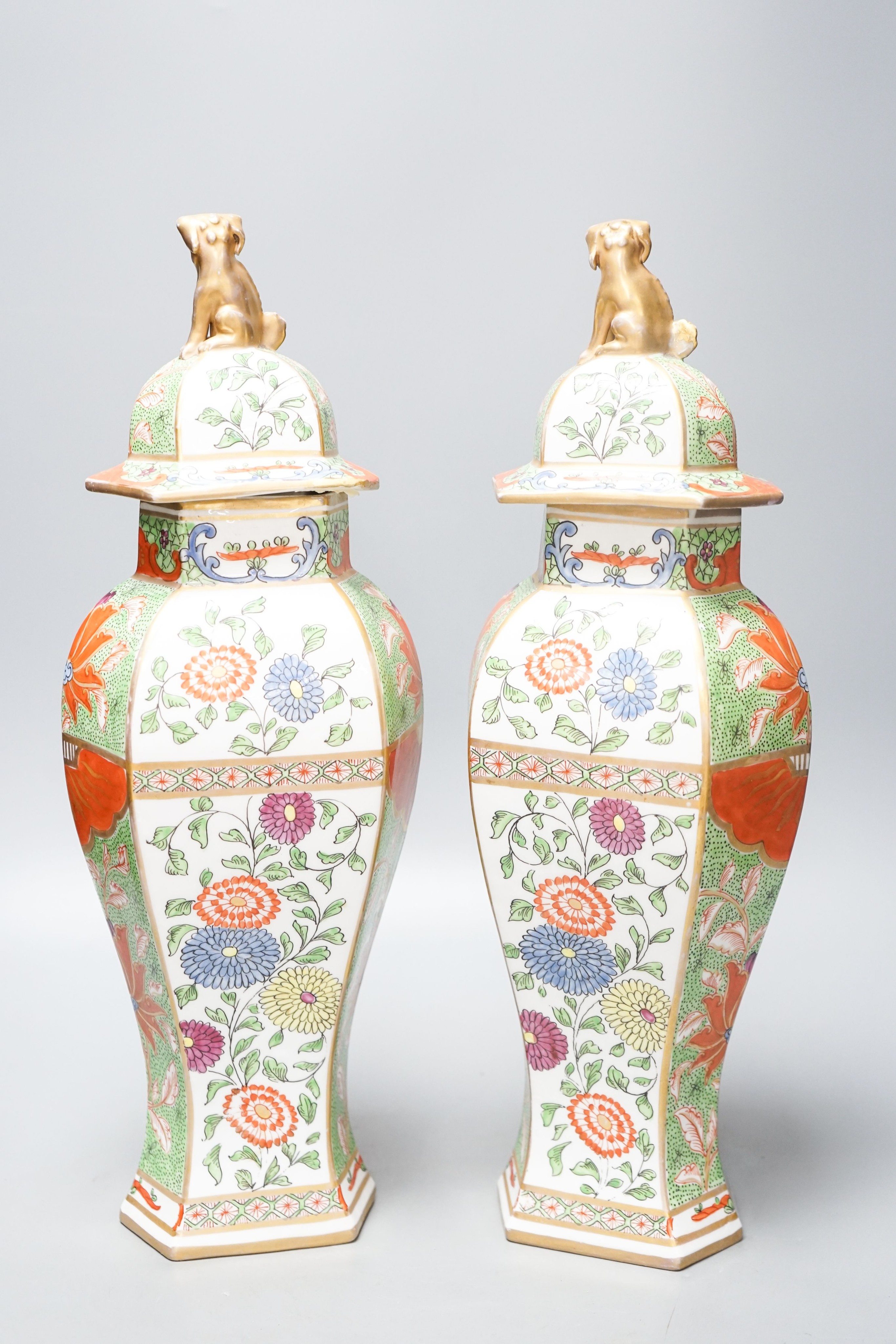 A pair of Samson kakiemon style lidded hexagonal baluster vases 41cm